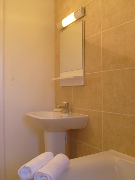 image of basin with shaver light and mirror